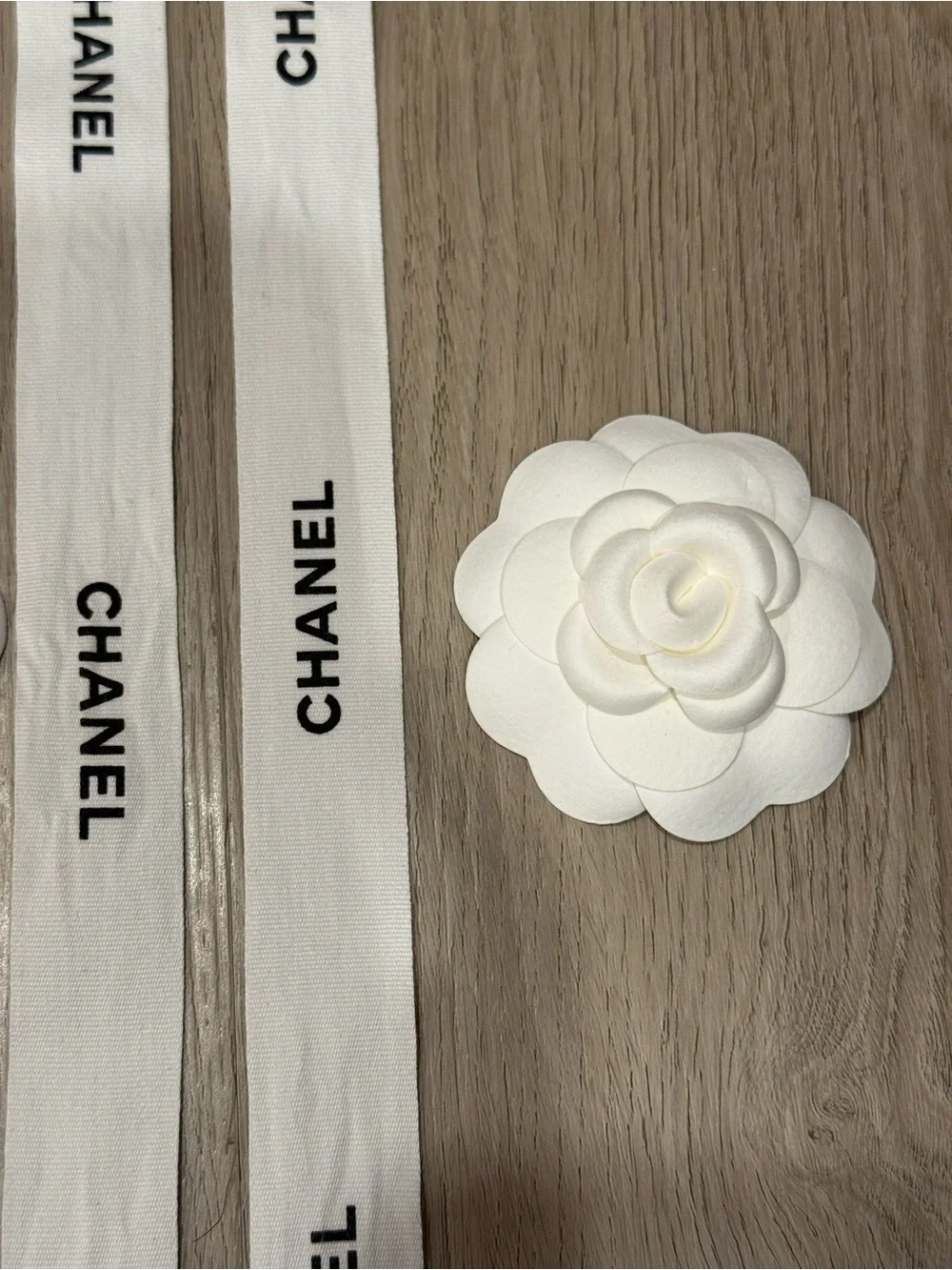 CHANEL ribbons, charms, camellias
